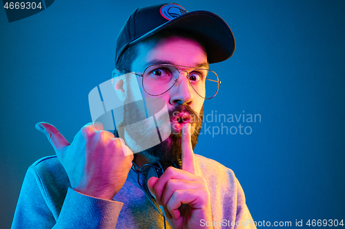 Image of Enjoying his favorite music.