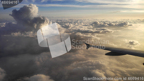 Image of Airplane wing view out of the window 