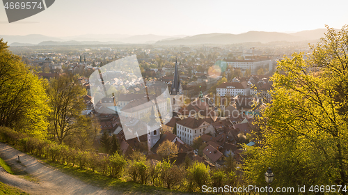 Image of Panoramic view of Ljubljana, capital of Slovenia. Roooftops of Ljubljanas old medieval city center seen from Ljubljanas castle park at sunset