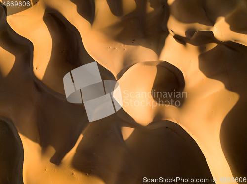 Image of Aerial top view on sand dunes in desert