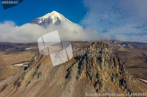 Image of Verblyud rock and Koryaksky volcano