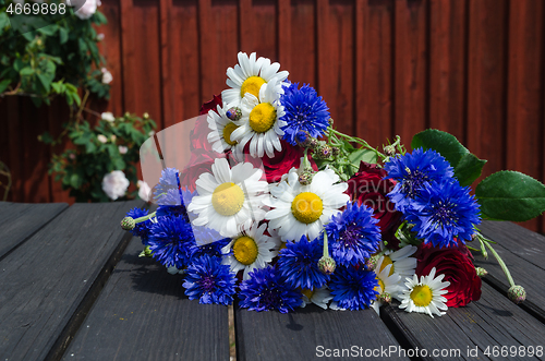 Image of Summer flowers close up on a table