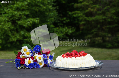 Image of Summer flowers and cream cake