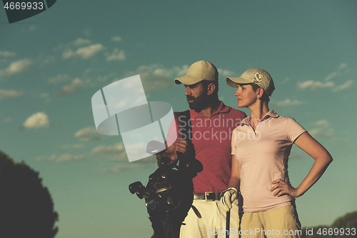 Image of portrait of couple on golf course