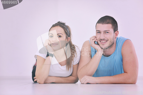 Image of happy young couple fitness workout and fun