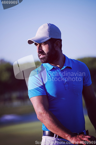 Image of golfer  portrait at golf course