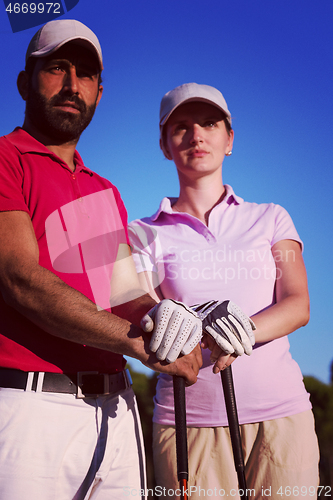 Image of portrait of couple on golf course