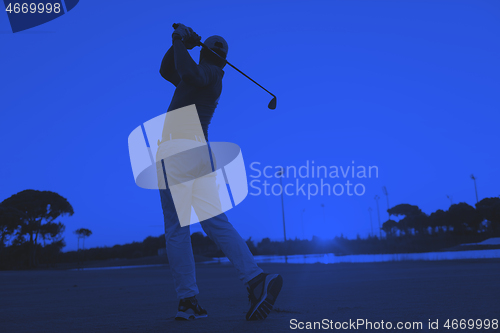 Image of golfer hitting long shot