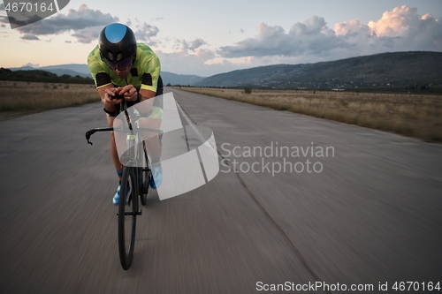 Image of triathlon athlete riding a bike