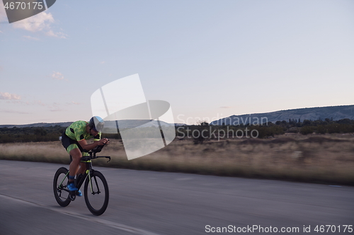 Image of triathlon athlete riding a bike