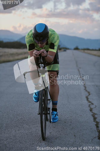 Image of triathlon athlete riding a bike