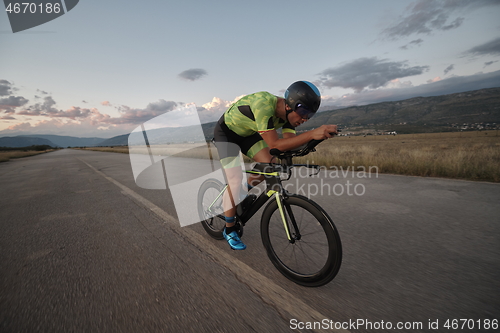 Image of triathlon athlete riding a bike