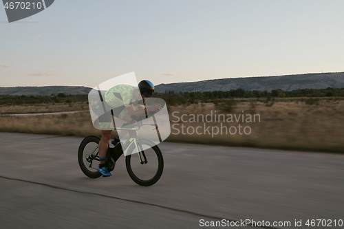 Image of triathlon athlete riding a bike