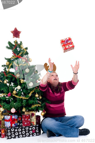 Image of Happy girl catching a present