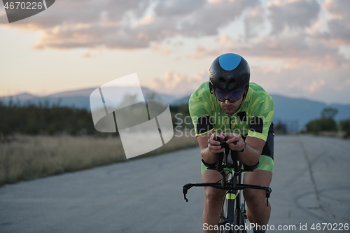 Image of triathlon athlete riding a bike