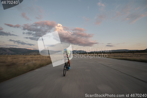 Image of triathlon athlete riding a bike