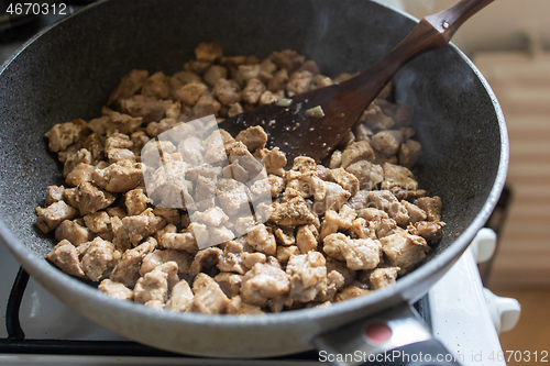 Image of chopped pork roast on a pan