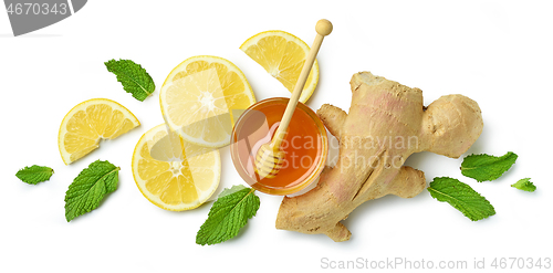 Image of composition of ginger, lemon and honey