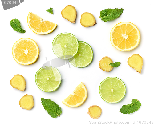 Image of lime and lemon slices on white background