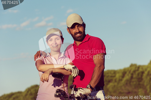 Image of portrait of couple on golf course