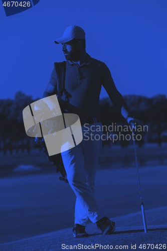 Image of golfer  portrait at golf  course