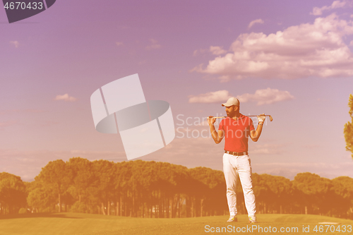 Image of handsome middle eastern golf player portrait at course