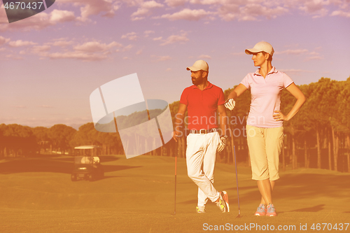 Image of portrait of couple on golf course