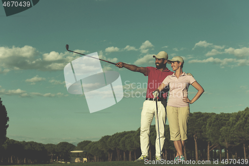 Image of portrait of couple on golf course