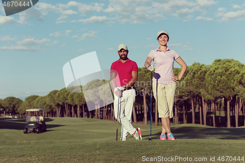 Image of portrait of couple on golf course