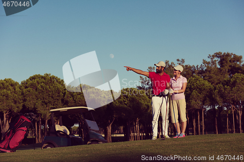 Image of portrait of couple on golf course