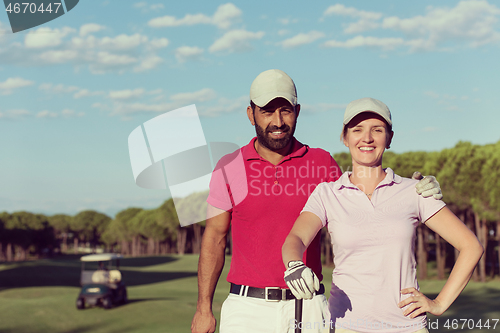 Image of portrait of couple on golf course