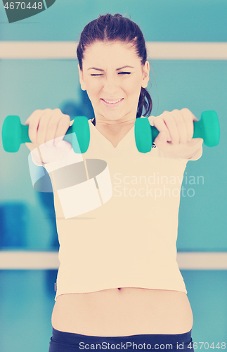 Image of woman fitness workout with weights