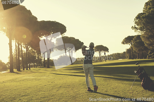 Image of golf player hitting long shot