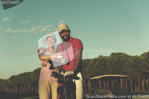 Image of portrait of couple on golf course