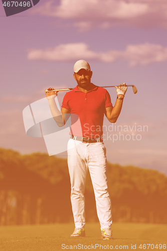 Image of handsome middle eastern golf player portrait at course