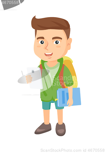 Image of Caucasian schoolboy holding cellphone and textbook