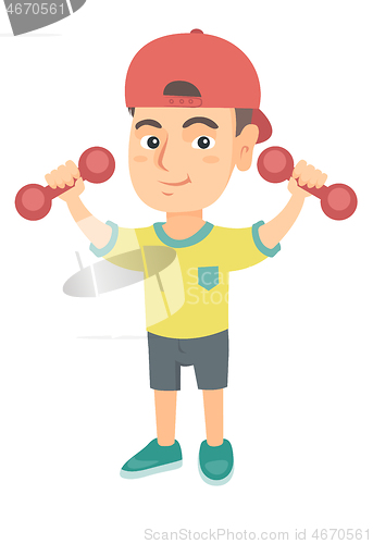 Image of Little smiling caucasian boy holding dumbbells.