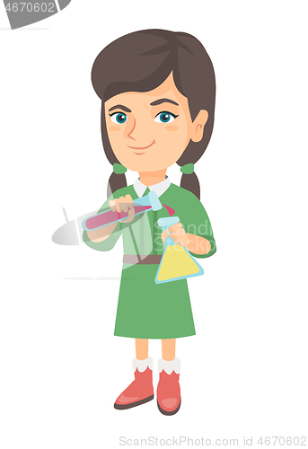 Image of Girl pouring liquid from a tube and into a flask.