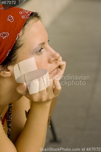 Image of unhappy woman in red kerchief