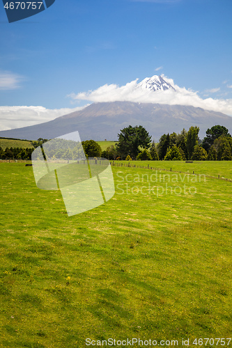 Image of volcano Taranaki covered in clouds, New Zealand 