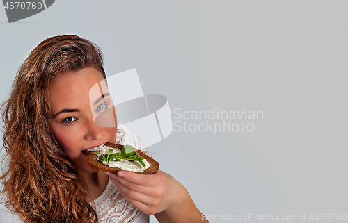 Image of Woman eats vegan and healthy