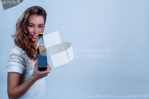 Image of Young woman with bottle