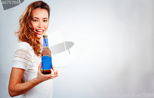 Image of smiling woman with bottle