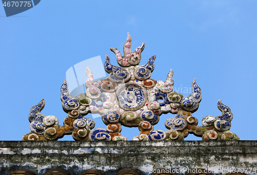 Image of Decoration on a temple roof in Vietnam