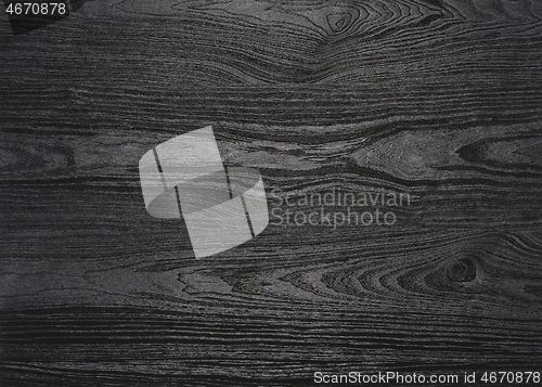 Image of black wood grain surface