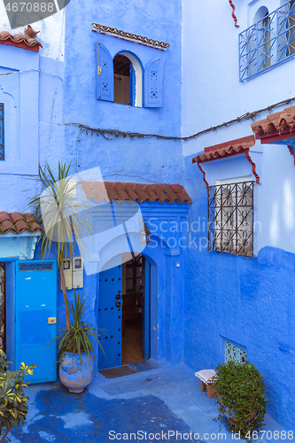 Image of Traditional house on blue street Morocco