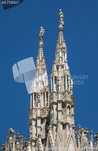 Image of Marble statues on top of cathedral roof