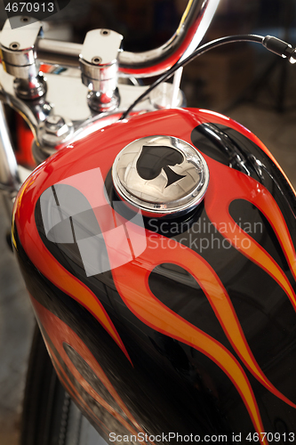 Image of Custom bobber motorbike in an workshop garage.