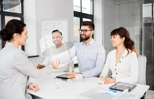 Image of recruiters having interview with employee