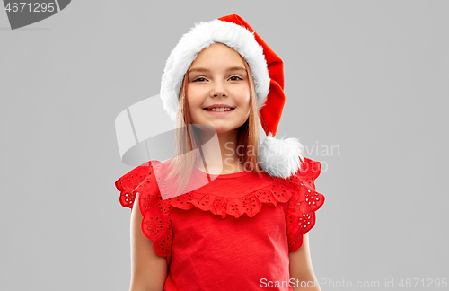 Image of smiling girl in snata helper hat